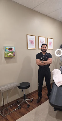 Dr Saqib Anwer in the treatment room at the Edmonton clinic
